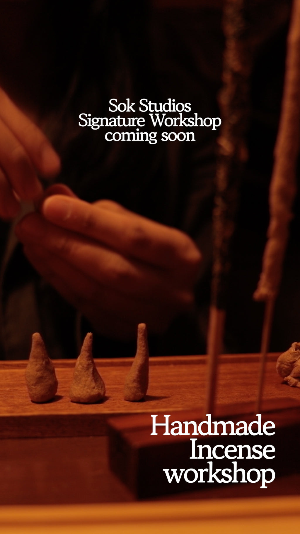 Handmade incense cones being shaped by hand at SOK Studios workshop"